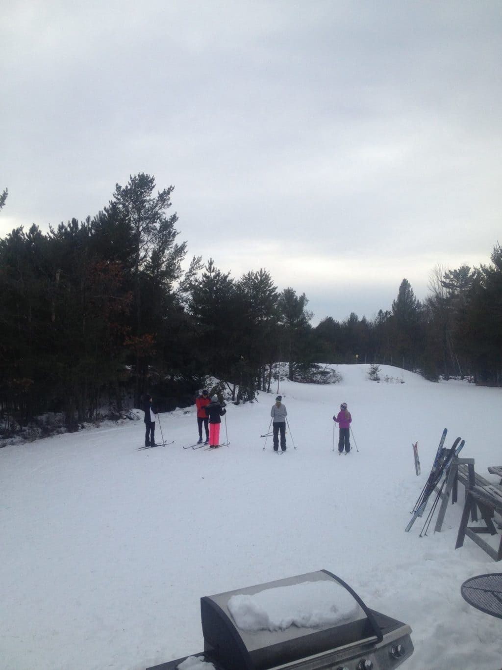 Ski Instructor Jim giving a family a ski lesson.