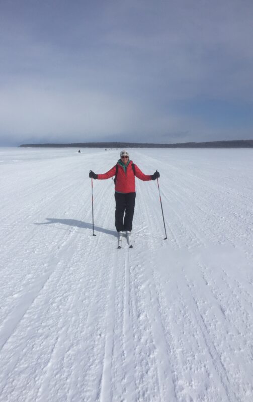 Skiing across ice bridge to Mackinaw Island Cross Country Ski Headquarters